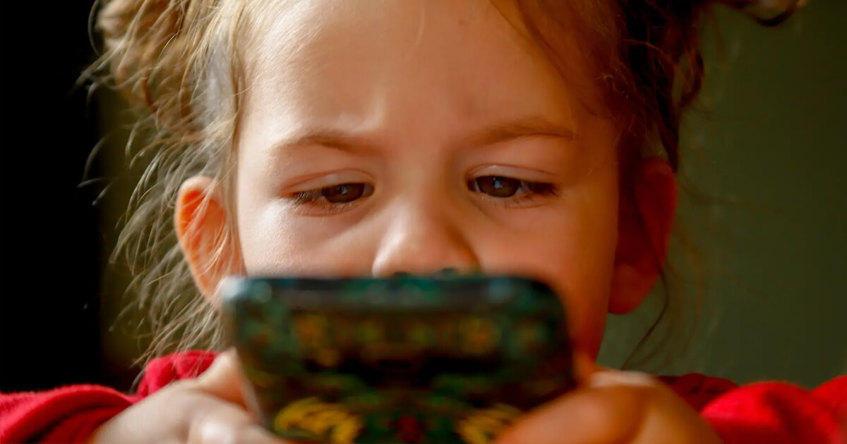 Toddler using cell phone