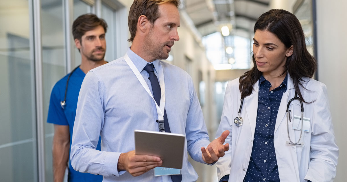 Doctors talking patient matching