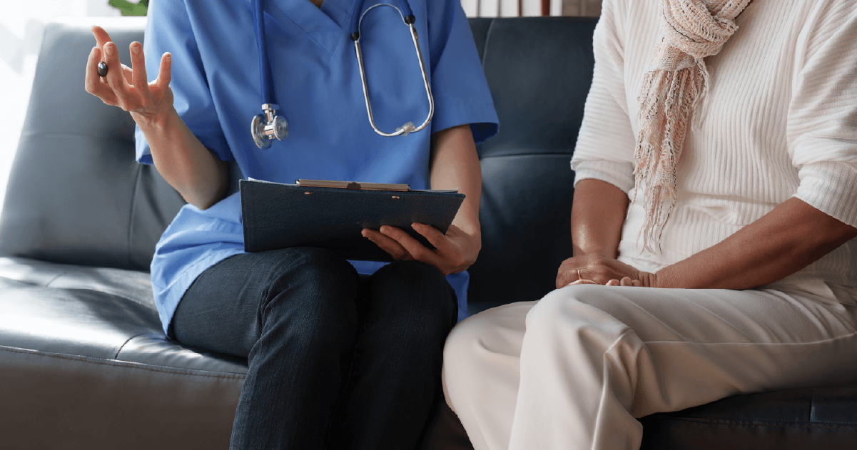 Woman with doctor evaluating her stroke risk